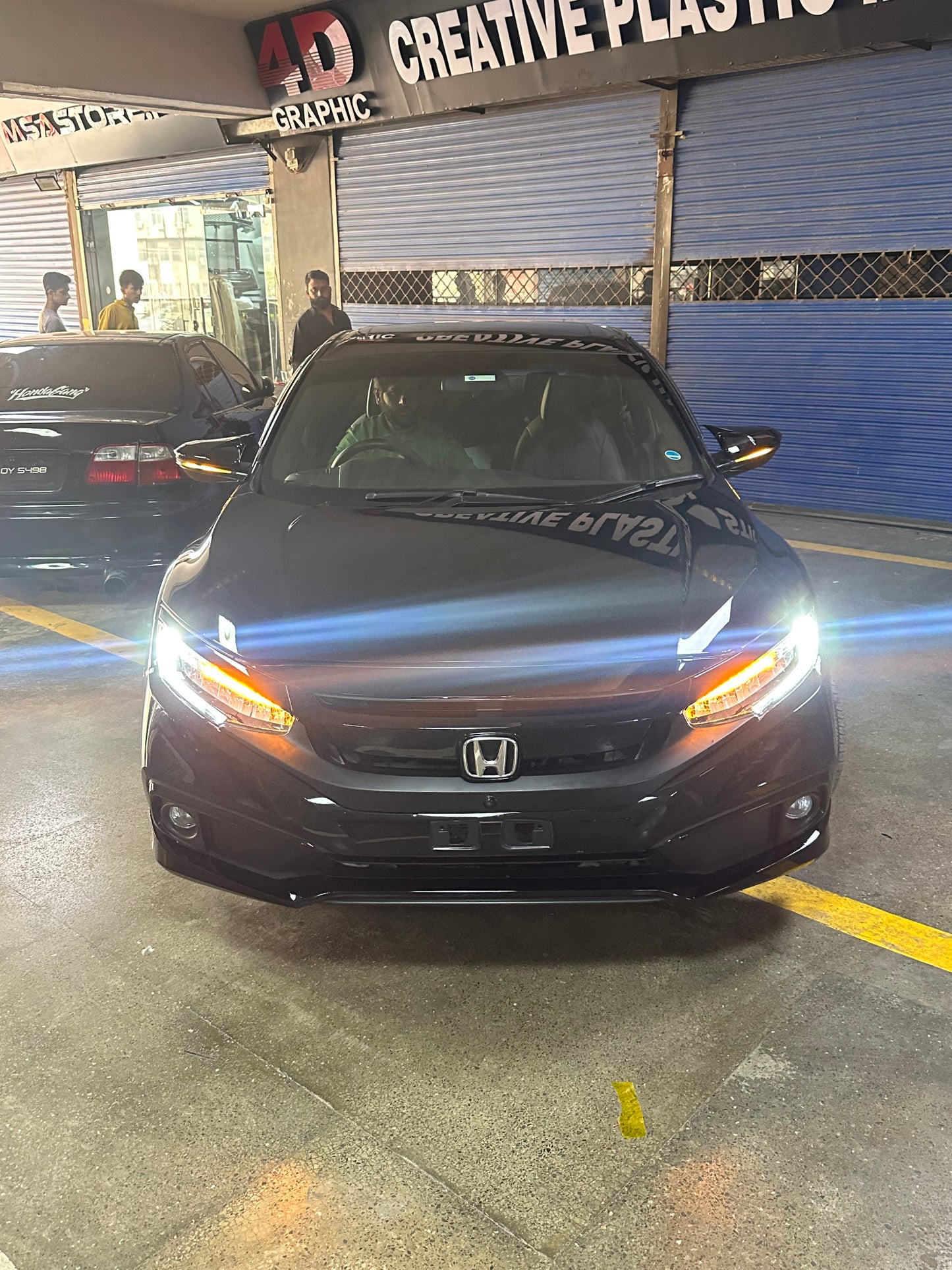 Honda Civic X Facelift style headlights.