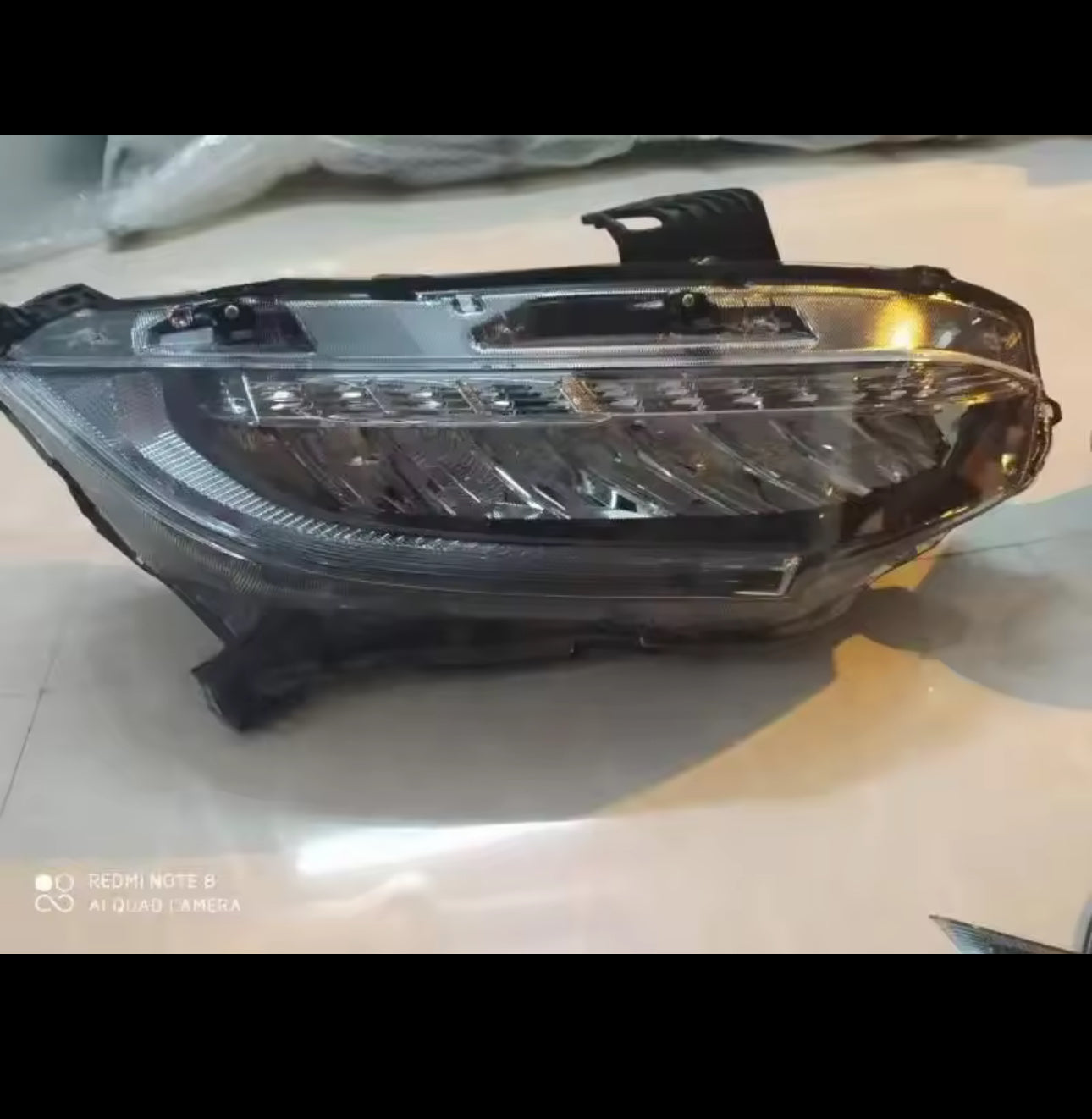 Honda Civic X Facelift style headlights.